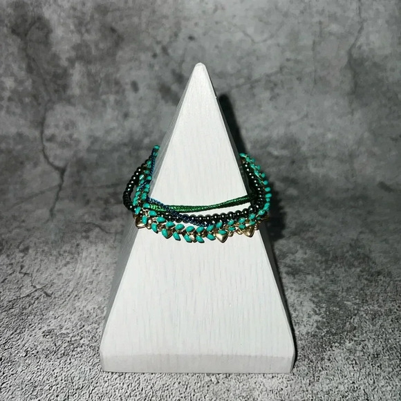 N22. PARIS!! IKITA STAMPED MULTI‎ STRAND BRACELET GOLD TONE CLOSURE TEAL/BLUE - Picture 1 of 5
